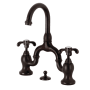 Kingston Brass French Country 1.2 GPM Bridge Bathroom Faucet with Pop-Up Drain Assembly Oil Rubbed Bronze