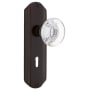 Nostalgic Warehouse Round Clear Crystal Passage Door Knob Set with Solid Brass Art Deco Back Plate, Keyhole and 2-3/8" Backset Timeless Bronze