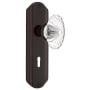 Nostalgic Warehouse Vintage Farmhouse Oval Fluted Crystal Flower Dummy Door Knob Set with Art Deco Plate and Keyhole Timeless Bronze