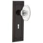 Nostalgic Warehouse Oval Fluted Crystal Solid Brass Dummy Door Knob Set with Mission Rose and Keyhole Timeless Bronze