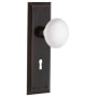 Nostalgic Warehouse White Porcelain Solid Brass Dummy Door Knob Set with New York Rose and Keyhole Timeless Bronze