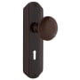 Nostalgic Warehouse Vintage Brown Porcelain Privacy Door Knob Set with Art Deco Plate, Keyhole and 2-3/8" Backset Timeless Bronze