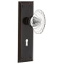 Nostalgic Warehouse Oval Fluted Crystal Solid Brass Privacy Door Knob Set with New York Rose, Keyhole and 2-3/8" Backset Timeless Bronze