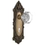 Nostalgic Warehouse Waldorf Lead Crystal Passage Door Knob Set with Solid Brass Victorian Backplate, Skeleton Keyhole and 2-3/8" Backset Antique Brass