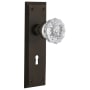 Nostalgic Warehouse Crystal Solid Brass Privacy Door Knob Set with New York Rose, Keyhole and 2-3/8" Backset Oil-Rubbed Bronze