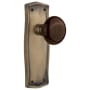 Nostalgic Warehouse Brown Porcelain Solid Brass Privacy Door Knob Set with Prairie Rose and 2-3/8" Backset Antique Brass