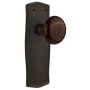 Nostalgic Warehouse Brown Porcelain Solid Brass Privacy Door Knob Set with Prairie Rose and 2-3/8" Backset Oil-Rubbed Bronze