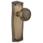 Nostalgic Warehouse Craftsman Solid Brass Privacy Door Knob Set with Prairie Rose and 2-3/8" Backset Antique Brass