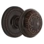 Nostalgic Warehouse Egg and Dart Solid Brass Passage Door Knob Set with Rope Rose and 2-3/8" Backset Timeless Bronze