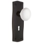Nostalgic Warehouse Vintage Farmhouse White Porcelain Single Dummy Door Knob with Solid Brass Backplate and Keyhole Timeless Bronze