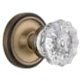 Nostalgic Warehouse Vintage Crystal Knob with Solid Brass Passage Door Knob Set with Classic Rose Plate and 2-3/4" Backset Antique Brass