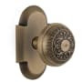 Nostalgic Warehouse Vintage Renaissance Egg and Dart Solid Brass Passage Door Knob Set with Cottage Style Plate and 2-3/4" Backset Antique Brass
