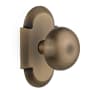 Nostalgic Warehouse New York Solid Brass Passage Door Knob Set with Cottage Rose and 2-3/4" Backset Antique Brass