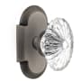 Nostalgic Warehouse Vintage Farmhouse Oval Fluted Crystal Flower Passage Door Knob Set with Solid Brass Cottage Style Plate and 2-3/4" Backset Antique Pewter