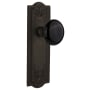Nostalgic Warehouse Black Porcelain Solid Brass Passage Door Knob Set with Meadows Rose and 2-3/4" Backset Oil-Rubbed Bronze