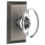 Nostalgic Warehouse Oval Clear Crystal Solid Brass Passage Door Knob Set with Studio Rose and 2-3/4" Backset Antique Pewter