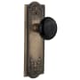 Nostalgic Warehouse Black Porcelain Solid Brass Passage Door Knob Set with Meadows Rose and 2-3/8" Backset Antique Brass