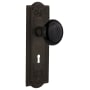 Nostalgic Warehouse Black Porcelain Solid Brass Passage Door Knob Set with Meadows Rose, Keyhole and 2-3/8" Backset Oil-Rubbed Bronze