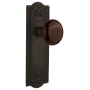 Nostalgic Warehouse Brown Porcelain Solid Brass Passage Door Knob Set with Meadows Rose and 2-3/8" Backset Oil-Rubbed Bronze