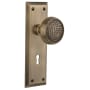 Nostalgic Warehouse Craftsman Solid Brass Passage Door Knob Set with New York Rose, Keyhole and 2-3/4" Backset Antique Brass