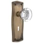 Nostalgic Warehouse Round Clear Crystal Solid Brass Privacy Door Knob Set with Prairie Rose, Keyhole and 2-3/8" Backset Antique Brass