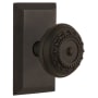 Nostalgic Warehouse Meadows Solid Brass Privacy Door Knob Set with Studio Rose and 2-3/8" Backset Oil-Rubbed Bronze