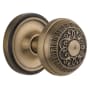 Nostalgic Warehouse Classic Renaissance Egg and Dart Solid Brass Privacy Door Knob Set with Classic Rose Plate and 2-3/4" Backset Antique Brass