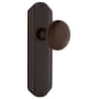 Nostalgic Warehouse Vintage Brown Porcelain Privacy Door Knob Set with Art Deco Plate and 2-3/4" Backset Timeless Bronze