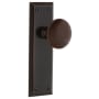 Nostalgic Warehouse Brown Porcelain Solid Brass Privacy Door Knob Set with New York Rose and 2-3/4" Backset Timeless Bronze