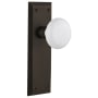 Nostalgic Warehouse White Porcelain Solid Brass Privacy Door Knob Set with New York Rose and 2-3/4" Backset Oil-Rubbed Bronze