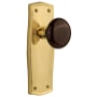 Nostalgic Warehouse Brown Porcelain Solid Brass Privacy Door Knob Set with Prairie Rose and 2-3/4" Backset Polished Brass
