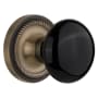 Nostalgic Warehouse Black Porcelain Solid Brass Privacy Door Knob Set with Rope Rose and 2-3/4" Backset Antique Brass
