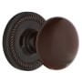 Nostalgic Warehouse Brown Porcelain Solid Brass Privacy Door Knob Set with Rope Rose and 2-3/4" Backset Timeless Bronze