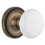 Nostalgic Warehouse White Porcelain Solid Brass Privacy Door Knob Set with Rope Rose and 2-3/4" Backset Antique Brass