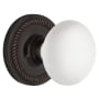 Nostalgic Warehouse White Porcelain Solid Brass Privacy Door Knob Set with Rope Rose and 2-3/4" Backset Timeless Bronze