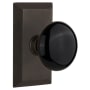 Nostalgic Warehouse Black Porcelain Solid Brass Privacy Door Knob Set with Studio Rose and 2-3/4" Backset Oil-Rubbed Bronze