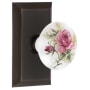 Nostalgic Warehouse Rose Porcelain Solid Brass Privacy Door Knob Set with Studio Rose and 2-3/4" Backset Timeless Bronze