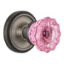 Nostalgic Warehouse Classic Solid Brass Rose Passage Door Knob Set with Pink Crystal Knob and 2-3/8" Backset Antique Pewter