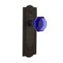 Nostalgic Warehouse Meadows Solid Brass Rose Passage Door Knob Set with Cobalt Waldorf Door Knob and 2-3/8" Backset Oil-Rubbed Bronze