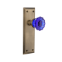 Nostalgic Warehouse New York Solid Brass Rose Passage Door Knob Set with Cobalt Crystal Knob for 2-3/4" Backset Antique Brass