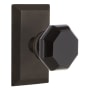 Nostalgic Warehouse Studio Solid Brass Rose Passage Door Knob Set with Black Waldorf Knob and 2-3/8" Backset Oil-Rubbed Bronze