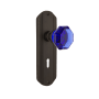 Nostalgic Warehouse Deco Solid Brass Rose Passage Door Knob Set with Cobalt Waldorf Knob and Decorative Keyhole for 2-3/4" Backset Oil-Rubbed Bronze