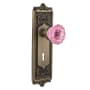 Nostalgic Warehouse Egg and Dart Solid Brass Single Dummy Door Knob with Pink Crystal Knob and Decorative Keyhole Antique Brass