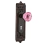 Nostalgic Warehouse Egg and Dart Solid Brass Single Dummy Door Knob with Pink Crystal Knob and Decorative Keyhole Timeless Bronze
