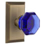 Nostalgic Warehouse Studio Solid Brass Rose Dummy Door Knob Set with Cobalt Waldorf Knob Antique Brass