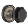 Nostalgic Warehouse Classic Solid Brass Rose Privacy Door Knob Set with Black Waldorf Knob and 2-3/4" Backset Antique Pewter
