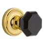 Nostalgic Warehouse Classic Solid Brass Rose Privacy Door Knob Set with Black Waldorf Knob and 2-3/4" Backset Polished Brass