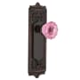 Nostalgic Warehouse Egg and Dart Solid Brass Rose Privacy Door Knob Set with Pink Crystal Knob for 2-3/8" Backset Timeless Bronze
