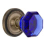 Nostalgic Warehouse Rope Solid Brass Rose Privacy Door Knob Set with Cobalt Waldorf Knob and 2-3/4" Backset Antique Brass