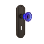 Nostalgic Warehouse Deco Solid Brass Rose Privacy Door Knob Set with Cobalt Crystal Knob and Decorative Keyhole for 2-3/8" Backset Oil-Rubbed Bronze